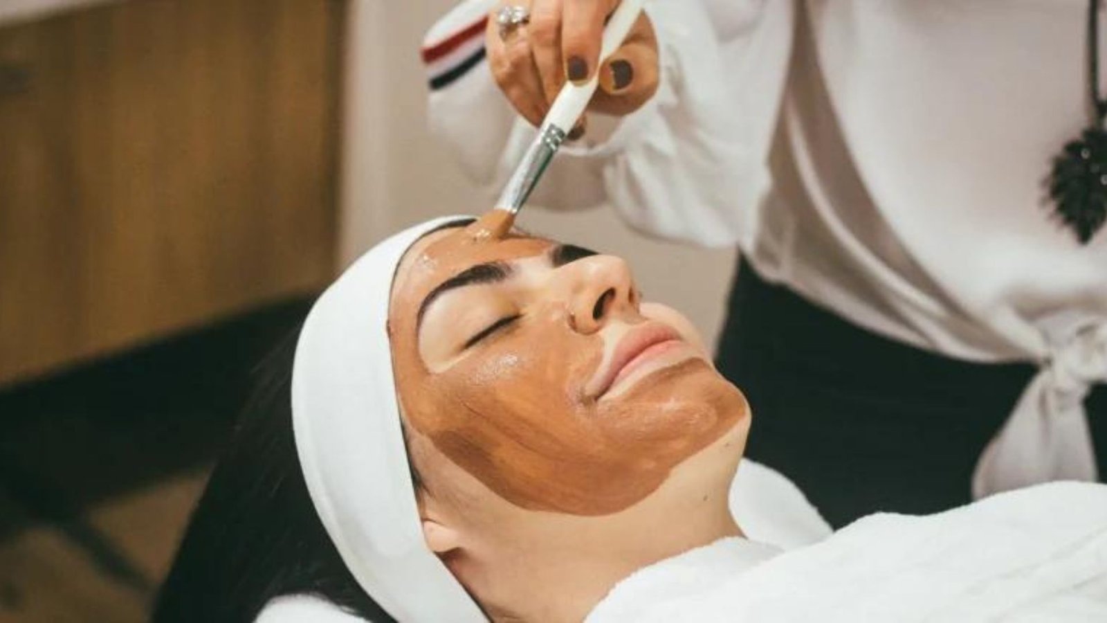 A Lady Getting Face Treatment which is the Top Skincare Tips for Glowing Skin